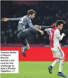  ?? AFP ?? Thomas Muller of Bayern Munich earned a red card for this challenge on Ajax’s Nicolas Tagliafico