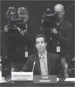  ?? ADRIAN WYLD / THE CANADIAN PRESS ?? Justice Committee Chair Anthony Housefathe­r brings down the gavel to start a committee meeting Wednesday that was adjourned without taking up an opposition motion.