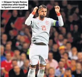  ??  ?? &gt; Skipper Sergio Ramos celebrates after heading in Spain’s second goal