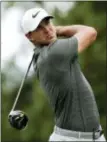  ?? CHUCK BURTON — THE ASSOCIATED PRESS FILE ?? Brooks Koepka watches his tee shot on the third hole during the third round of the PGA Championsh­ip at the Quail Hollow Club, in Charlotte, N.C.