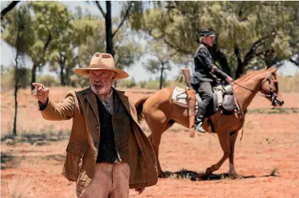  ??  ?? In Sweet Country, Sam Neill’s God-fearing station owner and Bryan Brown’s police officer are among those chasing an Aboriginal man accused of murder.