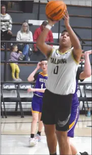  ?? PDN photo by Tom Firme ?? Talihina’s Tiger King goes up for a layup against Wister on Tuesday.