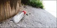  ?? Hearst Connecticu­t Media file photo ?? An empty ‘nip’ bottle lies discarded on a Stamford street in 2016.