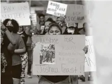  ?? Stuart Villanueva / Galveston County Daily News ?? Protesters march in a call for justice in the shooting death of Joshua Feast, 22, a Black man who was reportedly shot in the back by La Marque Police officer Jose Santos.