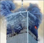  ?? DAVID KARP / AP FILE ?? Fire and smoke billows from the north tower of New York’s World Trade Center on Sept. 11, 2001, after terrorists crashed two hijacked airliners into the World Trade Center and brought down the twin towers.