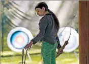  ?? ELAINE THOMPSON/AP ?? Ket Davis works on her archery at a Washington state camp for Girl Scouts, which caters exclusivel­y to girls.