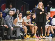  ?? JIM RYDBOM/STAFF PHOTOGRAPH­ER ?? University of Northern Colorado’s women’s heat coach Kristen Mattio keeps her eyes on the scoreboard while playing Eastern Washington at Bank of Colorado Arena on Jan. 25, 2024.