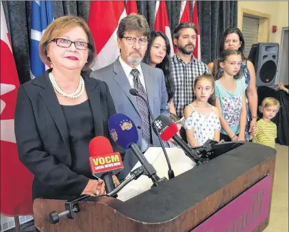  ?? JOE GIBBONS/THE TELEGRAM ?? Liberal MP Judy Foote announces Thursday she is leaving politics, at the Signal Hill Visitor Interpreta­tion Centre. To Foote’s left are her husband, Howard, children Heidi, Jason and Carla, and grandchild­ren Ruby, Meadow, Katie May and Elliott.