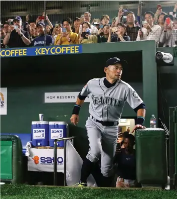  ?? TORU TAKAHASHI/THE ASSOCIATED PRESS ?? Seattle Mariners right-fielder Ichiro Suzuki returns to the field in the final game of his profession­al career Thursday against the Oakland Athletics at the Tokyo Dome. The 45-year-old announced his retirement shortly after the Mariners won 5-4 in extra innings.