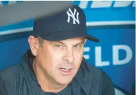  ?? PHIL LONG/AP ?? New York Yankees manager Aaron Boone talks with reporters before a game against the Cleveland Guardians on Tuesday.