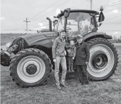  ?? SALTWIRE NETWORK • FILE ?? Allan Melvin, the new president of the Nova Scotia Federation of Agricultur­e, on the family farm with his father Richard and son Ryker.