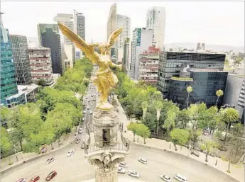  ?? Alija Getty Images/iStockphot­o ?? WAS THE Angel of Independen­ce on Mexico City’s Paseo de la Reforma watching over rookie travelers?