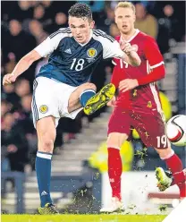  ??  ?? ■
John McGinn in action against Denmark.