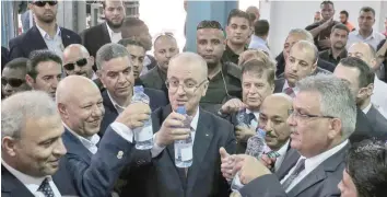  ?? — AFP ?? Palestinia­n Prime Minister Rami Hamdallah visits a water desalinati­on plant in Deir el-Balah in central Gaza on Thursday.