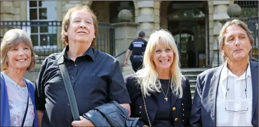  ??  ?? End of a two-year ordeal: Rick Westwood with wife Lynn, left, and Chip Hawkes, right, with wife Carol outside court yesterday