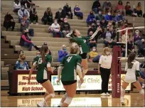  ?? TIM PHILIS — FOR THE NEWS-HERALD ?? Katie Sowko of Lake Catholic hits a spike during the Cougar’s 3-0 loss to NDCL in a Division II regional semifinal on Nov. 5 at Stow-Munroe Falls.