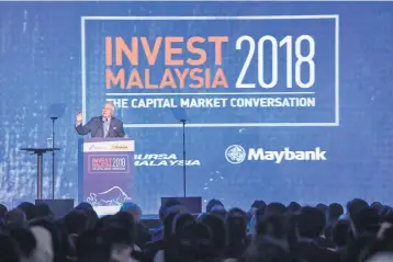  ??  ?? Najib reiterated that Malaysia’s strong position today was the result of tough decisions taken by the government, which also saw the diversific­ation of sources of income.