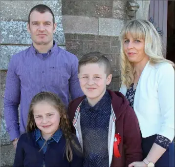  ??  ?? Cian Walsh who made his confirmati­on in Rathangan on Saturday morning, with Mark Clifford, Kayla Walsh and Tina Ryan