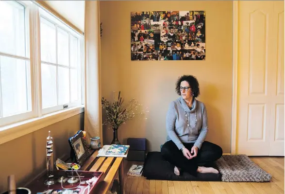  ?? PHOTOS: JESSICA KOURKOUNIS/WASHINGTON POST ?? Nancy Knoebel sits on a cushion in what was her son’s bedroom. She turned it into a meditation room after his 2016 death.