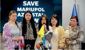  ?? AP ?? Ukrainian singer Ruslana, centre, flanked by the mothers and wives of the fighters at Mariupol’s steel mill, appeals to Turkey’s president to save Ukrainian fighters at a news conference in Istanbul.