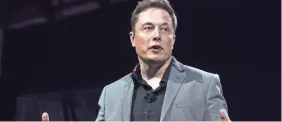  ?? RINGO H.W. CHIU/AP ?? Elon Musk says his Boring Company flamethrow­ers sold out in five days. At $500 each, the sellout would represent roughly $10M in sales.