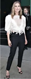  ?? ?? Lace: Rosamund Pike in YSL