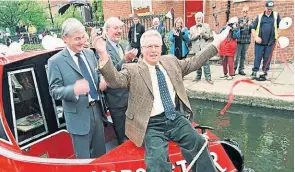  ?? ?? Flashback two decades: John Craven, TV broadcaste­r and vice-president of The Waterways Trust, reopens the Rochdale Canal outside Dukes 92 bar and restaurant in Manchester on July 1, 2002.