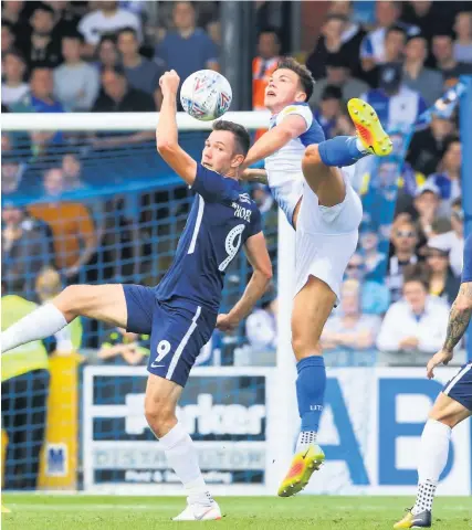  ?? Picture: Ryan Hiscott/JMP ?? Bristol Rovers defender Tom Broadbent, right, has an aerial battle with Southend’s Tom Hopper at the Memorial Stadium this season