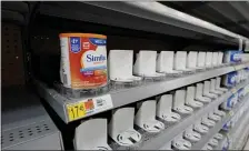  ?? AP ?? BARREN: Shelves typically stocked with baby formula sit mostly empty at a store in San Antonio, Tuesday.