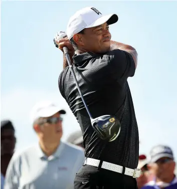  ?? PHOTO AFP ?? Tiger Woods a remis une carte de 69, hier, à l’issue de la première ronde de la compétitio­n Hero World Challenge, aux Bahamas.