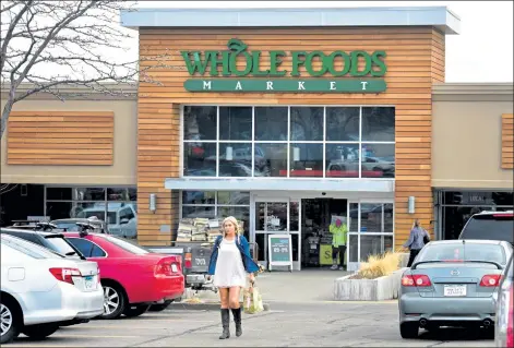 ?? Paul Aiken / Camera file ?? Whole Foods ranked No. 10 in Greenpeace’s 2020 ranking of 20 large grocery chains’ efforts to eliminate singlue-use plastic. The slot was one higher than the chain was ranked in 2019.