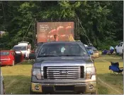  ?? MACOMB DAILY FILE PHOTO ?? Fans enjoy a past drive-in movie at Freedom Hill County Park in Sterling Heights. FAN will present a showing of the 1985sci-fi classic “Back to the Future” as part of a fundraiser in May 13.