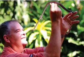  ??  ?? Biodiversi­ty conservati­on is at the heart of a project involving herpetolog­ist Dr Gavin Bedford (left), who is working with traditiona­l landowners in the NT to keep rare Oenpelli pythons (below) from extinction. Meanwhile, Aboriginal knowledge...