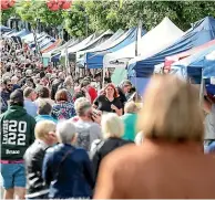  ?? AIMAN AMERUL MUNER/STUFF ?? Some of the thousands of people who flocked to the Timaru CBD on Friday night for the twilight market, shopping and entertainm­ent. Figures show that both Black Friday specials and the lead-up to Christmas boosted retail spending in South Canterbury.