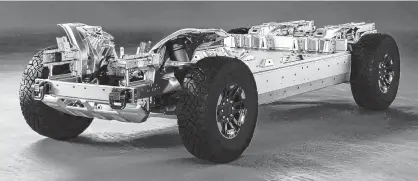  ??  ?? Compared to its lithium-ion rival, an aluminum-air battery could potentiall­y be cheaper, safer and vehicles using it would have a longer range. Pictured is GM’S Ultium battery-vehicle platform, which would use a lithium battery.