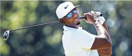  ??  ?? Memphis basketball coach Penny Hardaway watches his tee shot on the 4th hole during the Innerworki­ngs Pro-am at the Fedex St. Jude Classic at TPC Southwind on June 6, 2018. MARK WEBER/THE COMMERCIAL APPEAL