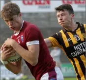  ??  ?? Jack O’Connor is tackled by Eoghan Nolan.