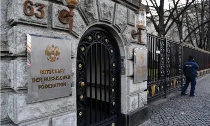  ?? ?? A police officer stands in front of the Russian embassy in Berlin. Photograph: John MacDougall/AFP/Getty Images