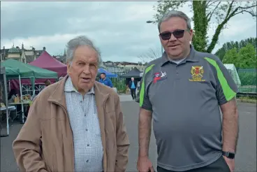  ?? (Pic: John Ahern) ?? Members of Fermoy Rowing Club, Jim Baylor and Ken Barry who were at last Saturday morning’s farmers’ market in the Mill Island carpark, Fermoy.