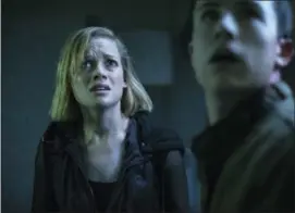  ??  ?? Jane Levy, left, and Dylan Minnette in a scene from “Dont Breathe.”