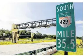  ?? JACOB LANGSTON/STAFF PHOTOGRAPH­ER ?? A new section of the Wekiva Parkway extends the road where it currently ends to an interchang­e at Kelly Park Road. Drivers can pay for tolls with transponde­rs or “Pay-by-Plate.”