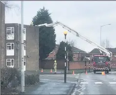  ??  ?? ■ Fire crews attend Granger Court in Loughborou­gh, where part of the roof was blown off.
Photo by Bryce Foubister.