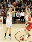  ?? Photo courtesy of College of the Ozarks (Mo.) ?? John Brown University forward Luize Strastina goes up for a shot Friday against Indiana Wesleyan in the Coke Classic held at the College of the Ozarks.