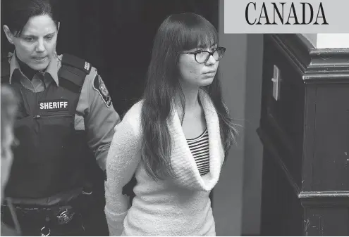  ?? ANDREW VAUGHAN/THE CANADIAN PRESS/FILES ?? Lindsay Souvannara­th arrives at provincial court in Halifax in March 2015. Souvannara­th was obsessed by the 1999 Columbine High School shooting rampage, and planned on replicatin­g the carnage in a Halifax mall with her co-conspirato­r, James Gamble, who...