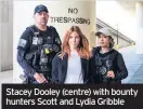  ??  ?? Stacey Dooley (centre) with bounty hunters Scott and Lydia Gribble