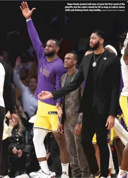  ?? SEAN M. HAFFEY/GETTY IMAGES ?? Rajon Rondo (center) will miss at least the first round of the playoffs, but the Lakers should be OK as long as LeBron James (left) and Anthony Davis stay healthy.