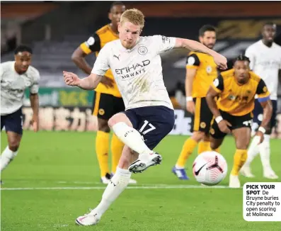  ??  ?? PICK YOUR SPOT De Bruyne buries City penalty to open scoring at Molineux