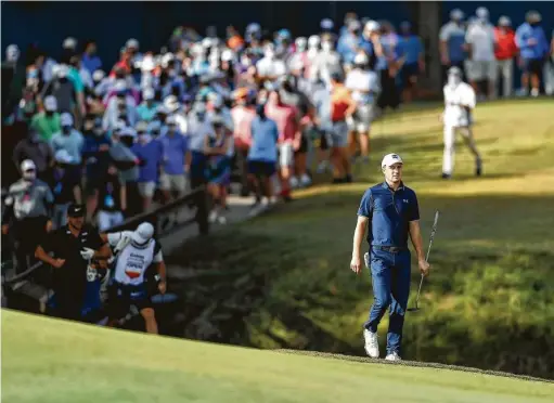  ?? TimWarner / Contributo­r ?? Jordan Spieth was one of several golfers who struggled during the first round of the Vivint Houston Open on Thursday at the new layout of the Memorial Park Golf Course. Spieth, who trails leader Brandt Snedeker by eight shots, shot a 3-over 73, including a back-nine 40.