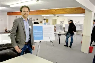  ?? SOUTHERN ALBERTA NEWSPAPERS PHOTO ?? Connor Smith with Al-Terra Engineerin­g meets and greets residents and stakeholde­rs during an Open House on the Municipal District of Taber’s Transporta­tion Master Plan at the Vauxhall and District Senior Citizen Centre.