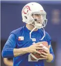  ?? RYAN REMIORZ, THE ASSOCIATED PRESS ?? Alouettes newest QB, Johnny Manziel, was at practice at Olympic Stadium on Monday.